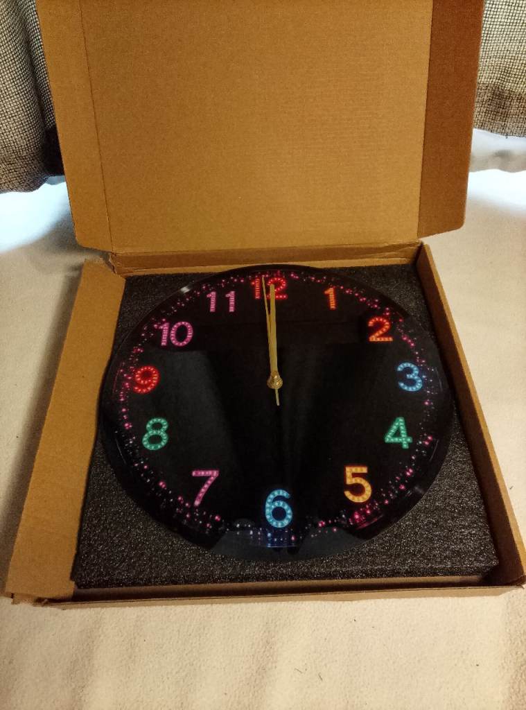 Black Wall Clock with Colourful Numbers – Good Condition