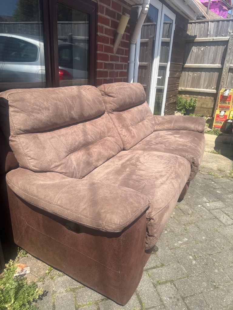 Reclining brown sofa