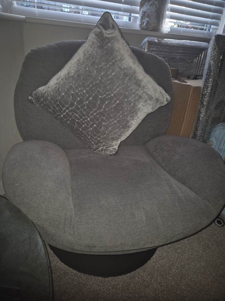 Grey Swivel Cuddle Chair – Good Condition, Fabric
