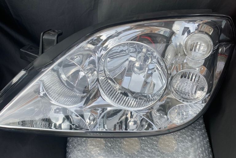 New Nissan PRIMERA p12 headlight passenger side 