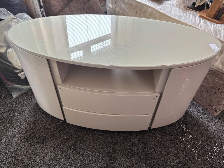 Large oval Tv unit with glass top