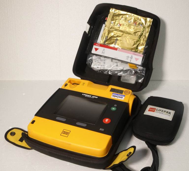Physio Control Lifepak 1000 Defibrillator AED + Accessories