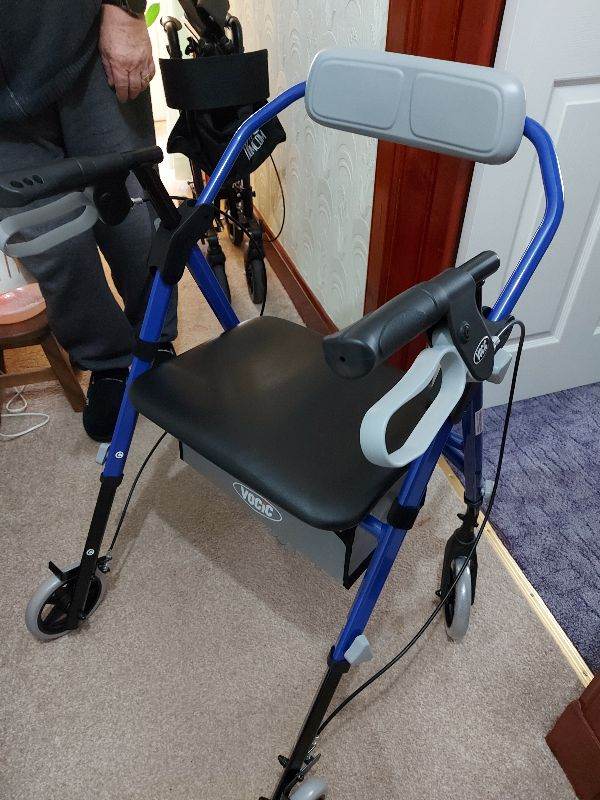 Mobility walker with seat