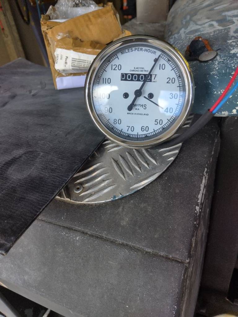 Retro motorcycle speedo.