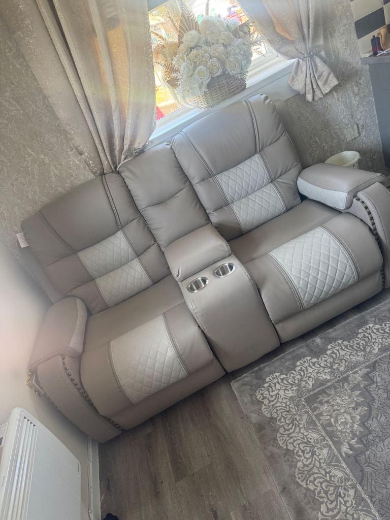 2 week old recliner sofa like new