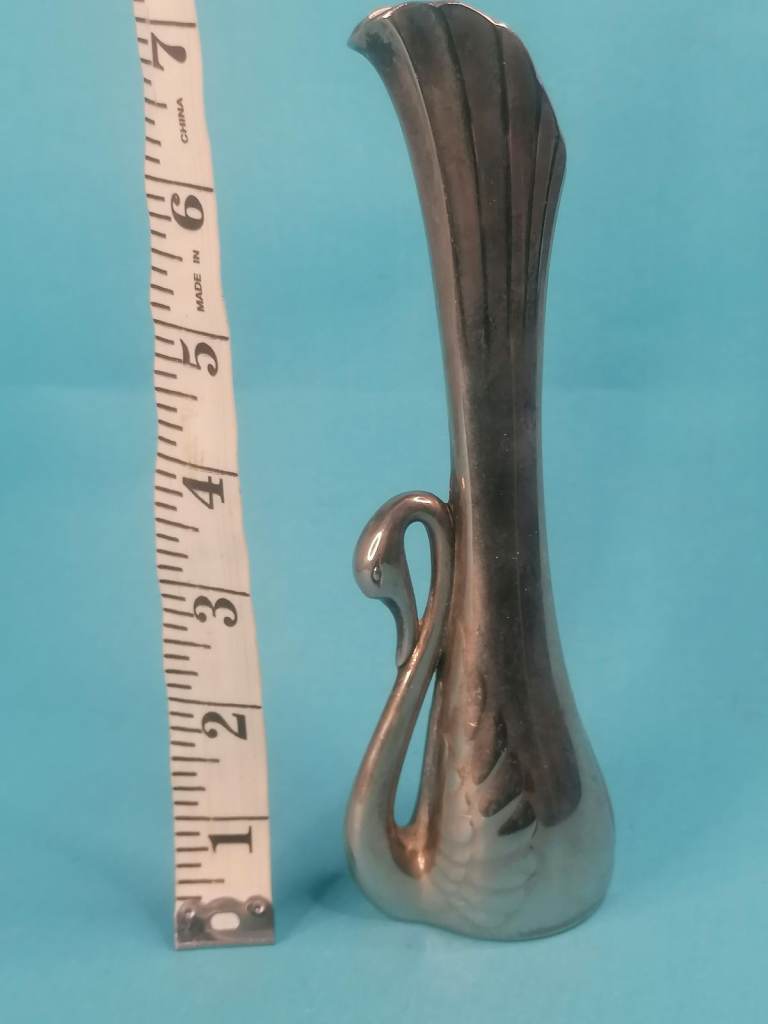 7-inch VINTAGE METAL SWAN SHAPE VASE. As seen.