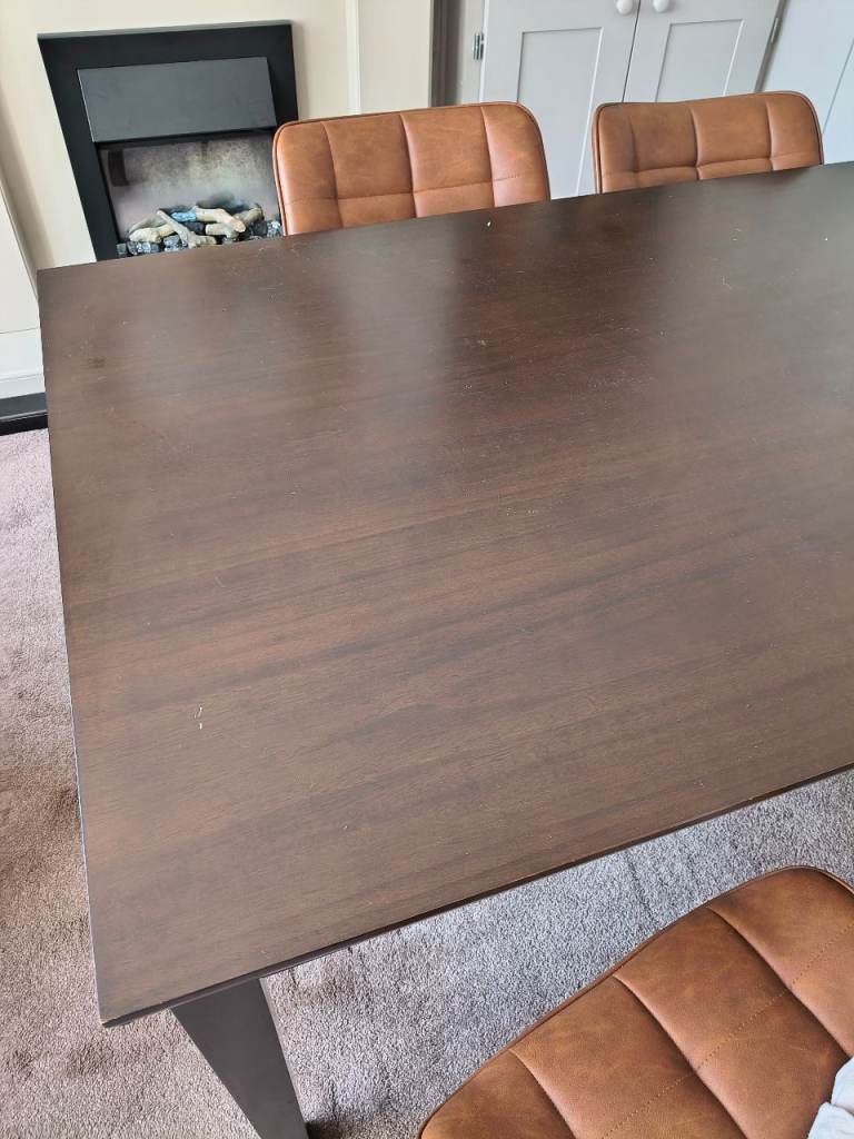 Solid Wood Dining Table – Good Condition