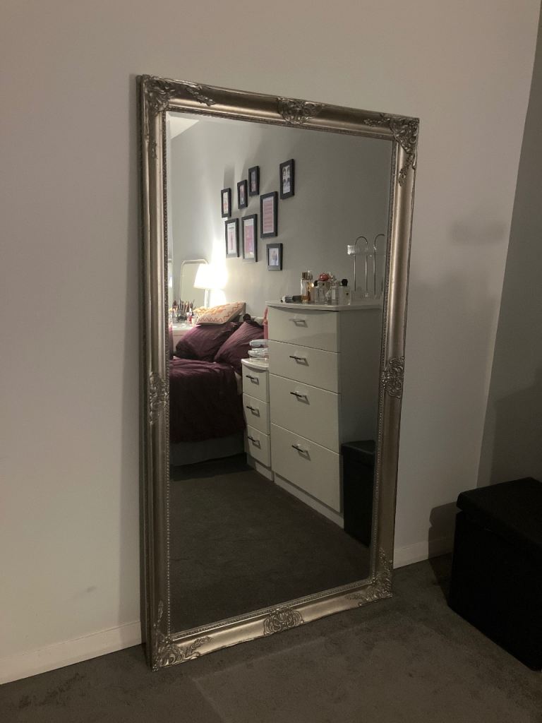 Full length, floor leaning mirror 