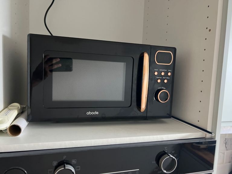 Abode Black Microwave Oven with Copper Accents – Good Condition
