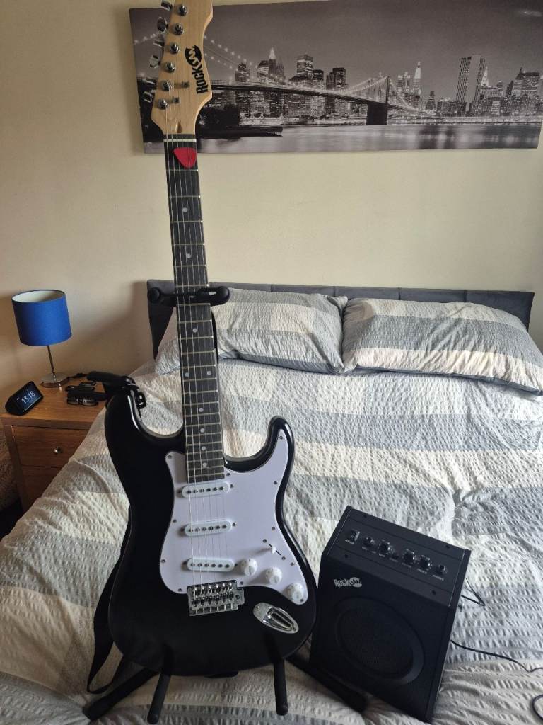 RockJam Electric Guitar with Amp and Stand – Good Condition