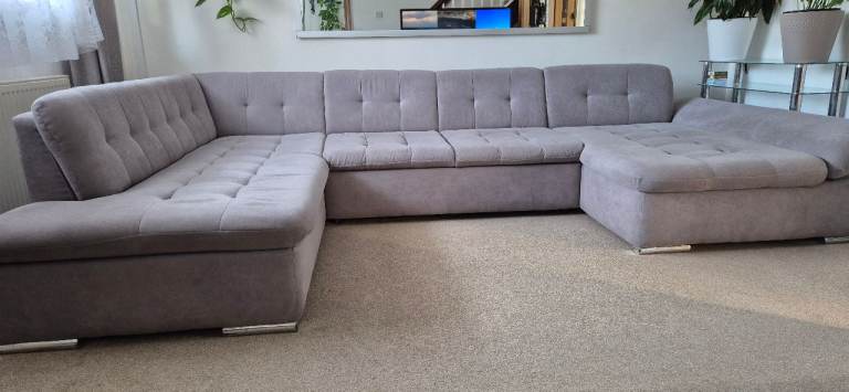 Huge U - shape, very comfy sofa bed with storage.