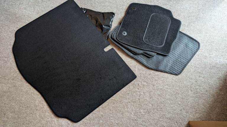 image for Ford Fiesta NEW set of car mats and boot mat 