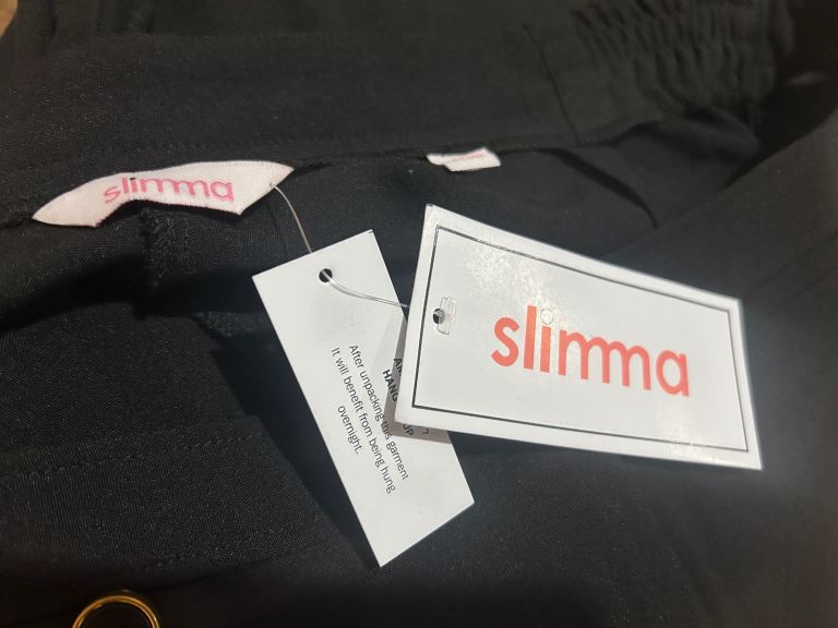 Brand new black trousers size 16