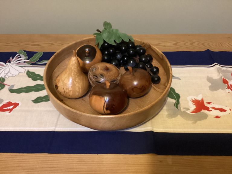 Wooden bowl with turned wooden fruit 