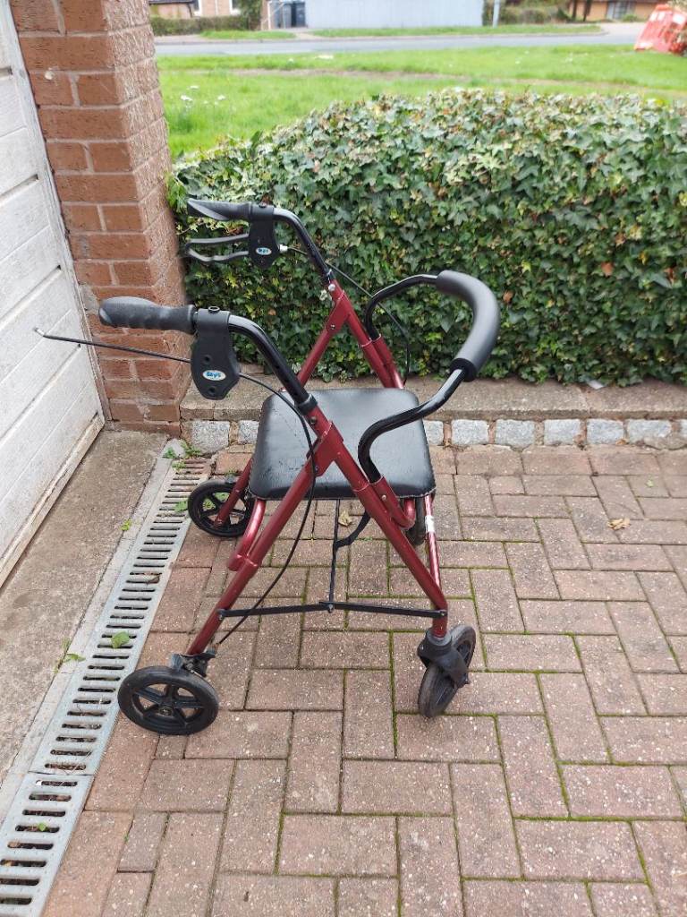 Walker with seat- needs repair 
