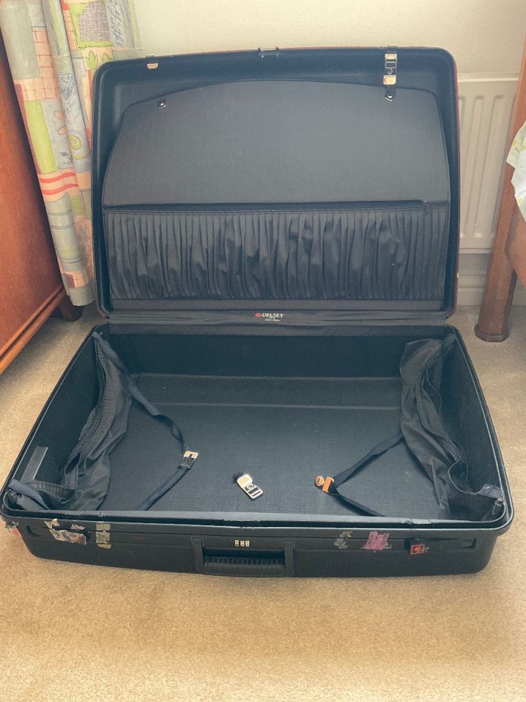 Suitcase Delsey hard shell approx 30 inches 