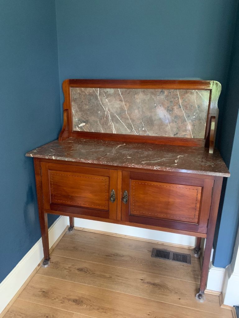 Antique washstand with marble top
