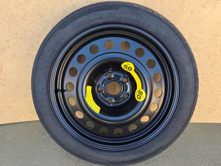 Spare wheel and tyre  T125/80R 18