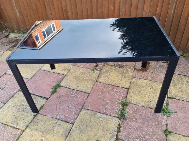 FREE. GLASS TOP DINING TABLE BLACK
