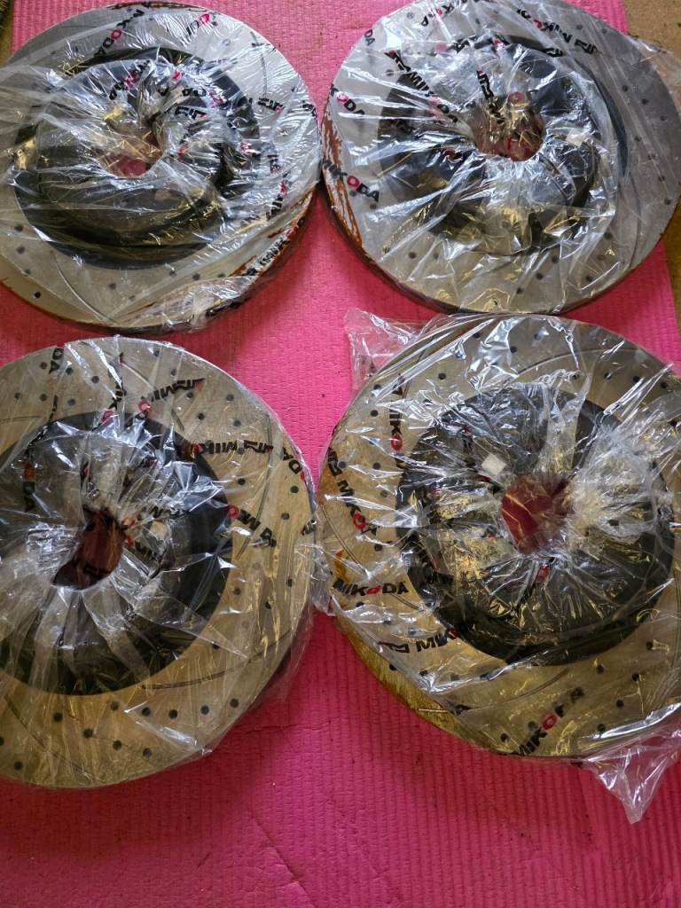 Audi S4 (2017)brake discs front and rear dimpled and groved.