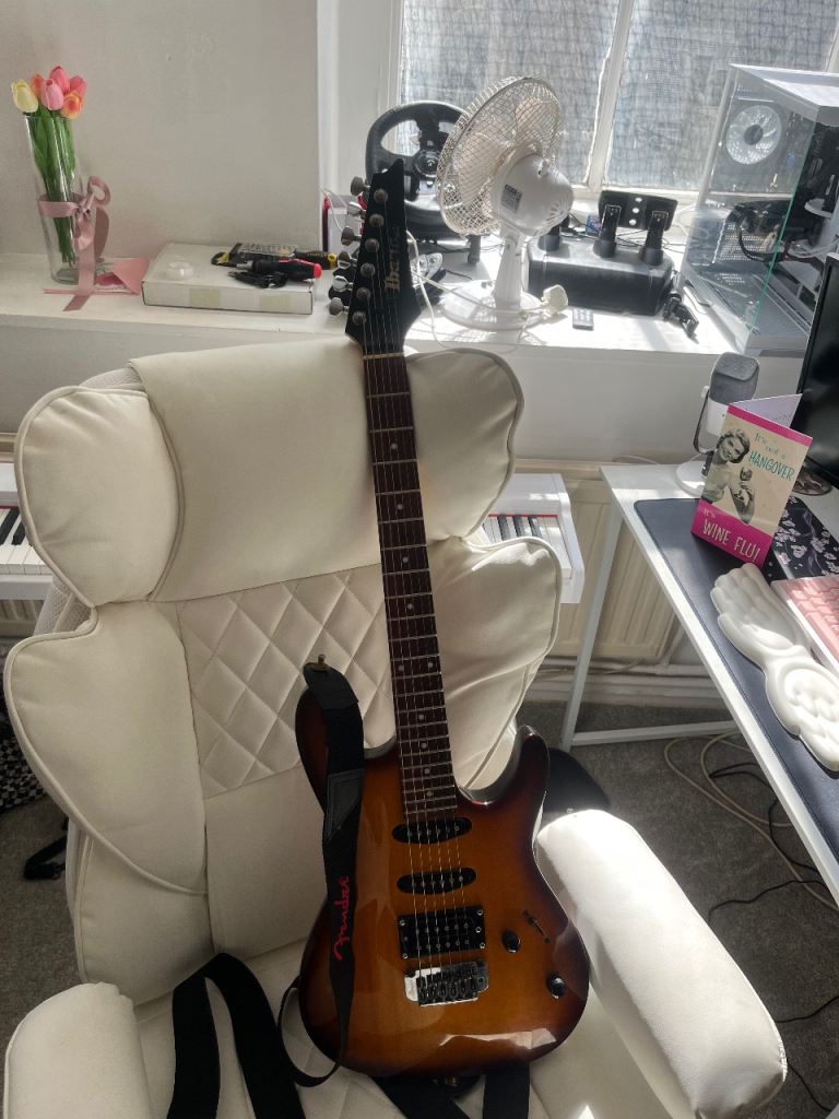 Brown Ibanez electric guitar