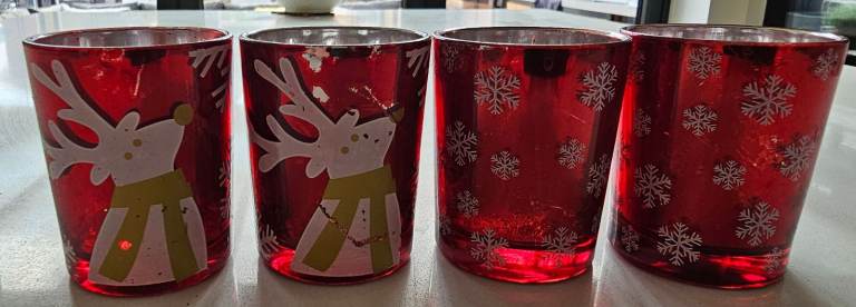 Christmas tea light holders x 4 in red with reindeer and snowflake design