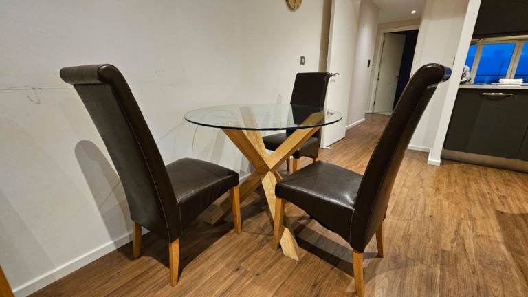 Small round dining table and 3 chairs
