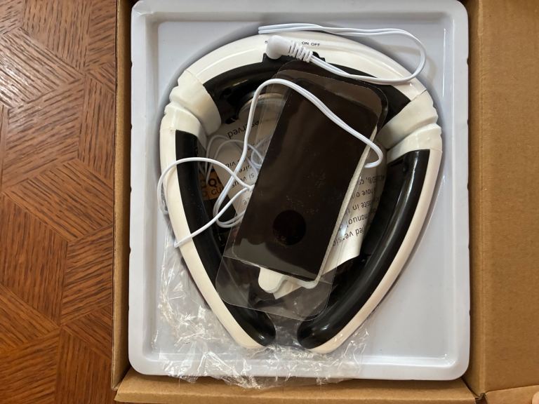 Ergonomic collar massager