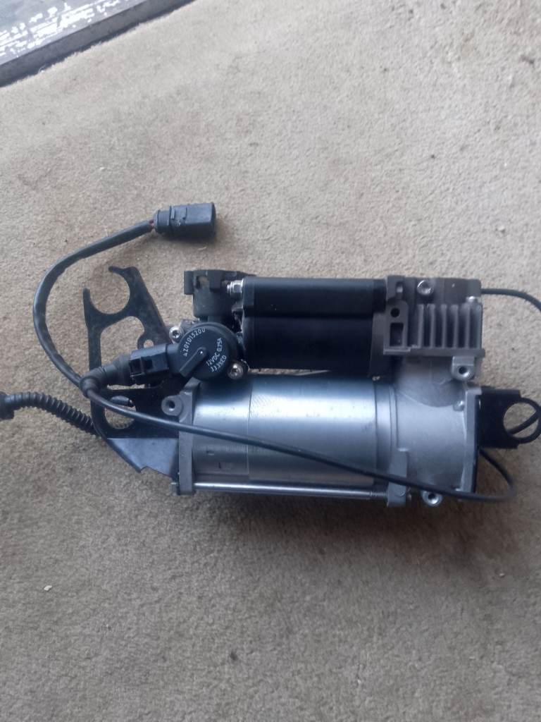 Audi q7 suspension pump 