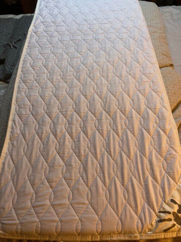 free cot mattress and two fitted sheets