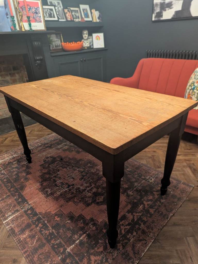 Vintage antique farmhouse dining table with black painted legs and natural top legs 