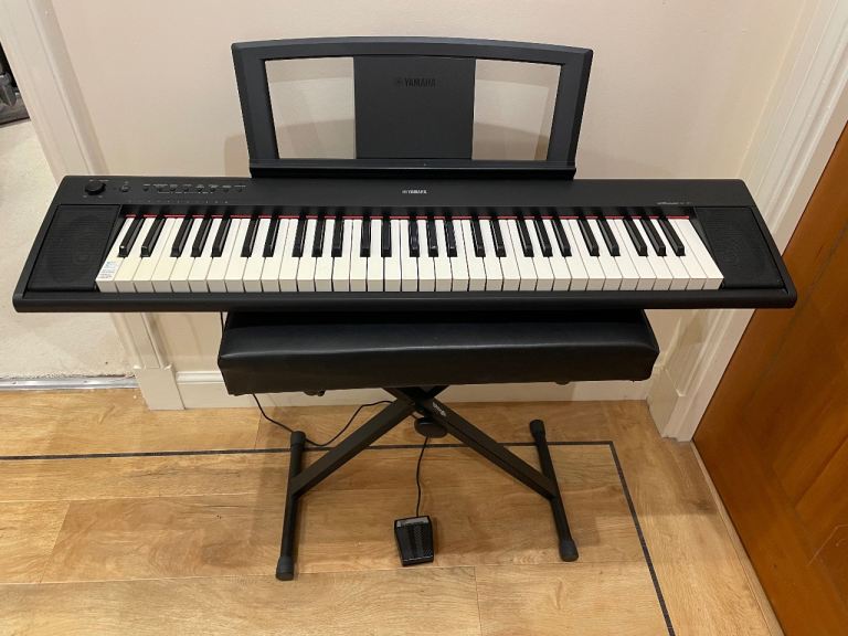 Piano keyboard Yamaha NP-11 with pedal, chair and stand 
