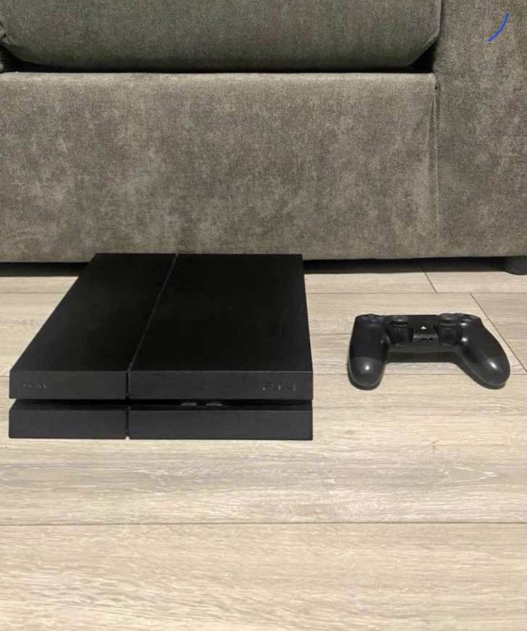 Playstation 4 500 GB with one working controller and 3 games