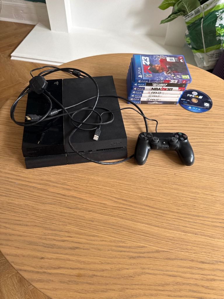 Sony PlayStation 4 PS4 with Controller and Games
