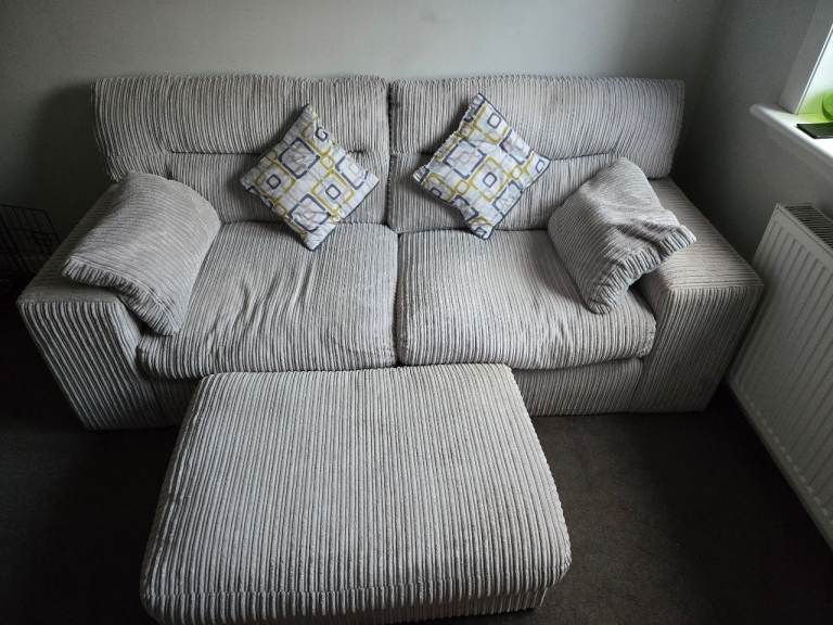 3 seater grey sofa with cushions