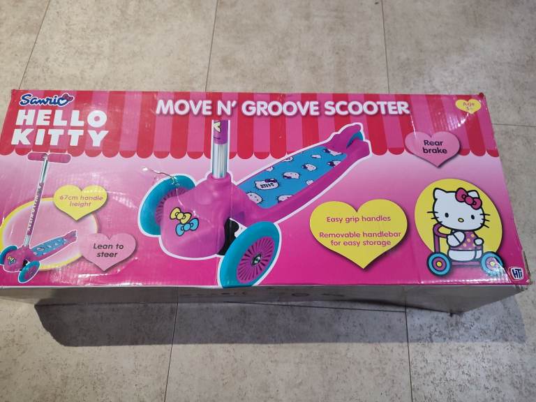 Hello kitty Move n groove scooter brand new in original packaging 