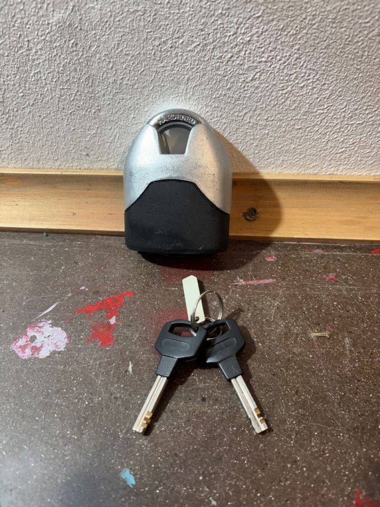 Heavy duty motorcycle brake disc lock