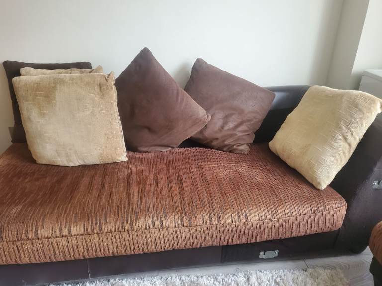 L shaped sofas with pillows