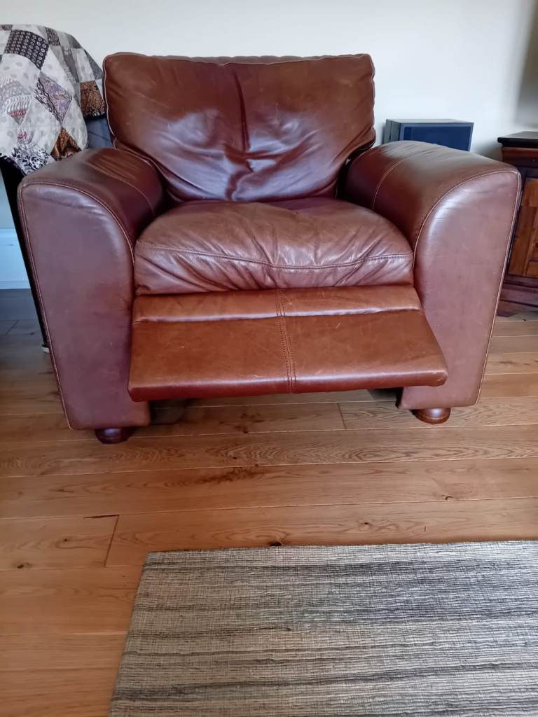 2 Real Leather 3 seater sofas plus matching reclining armchair 