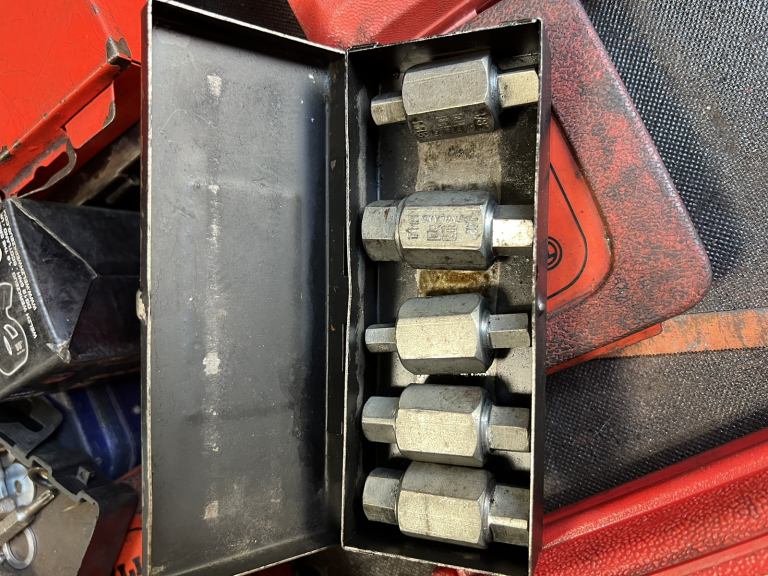 Sump plug removal kit in tin case.
