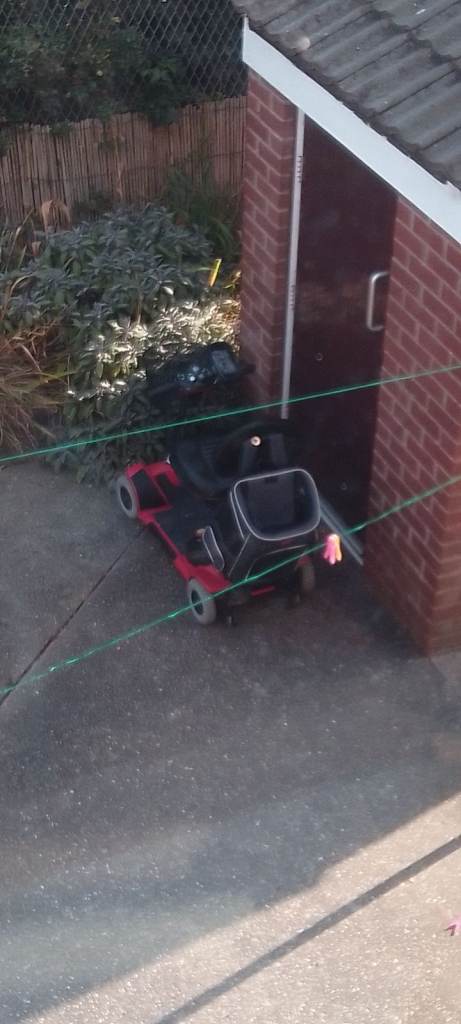 Red and Black Mobility Scooter – Good Condition