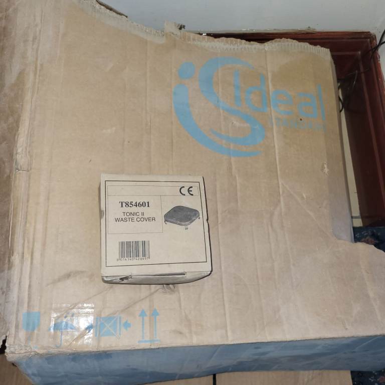 Ideal Standard white Sink with waste cover.