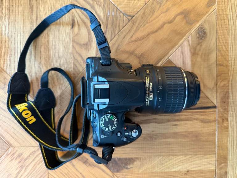 Nikon D5100 DSLR Camera Bundle – Includes 18-55mm Lens, Camera Bag & Dual Battery Charger