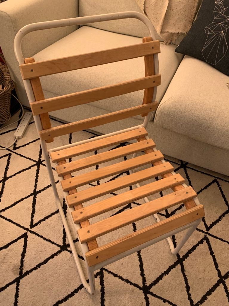 Pair of Vintage slatted stacking chairs with cushions