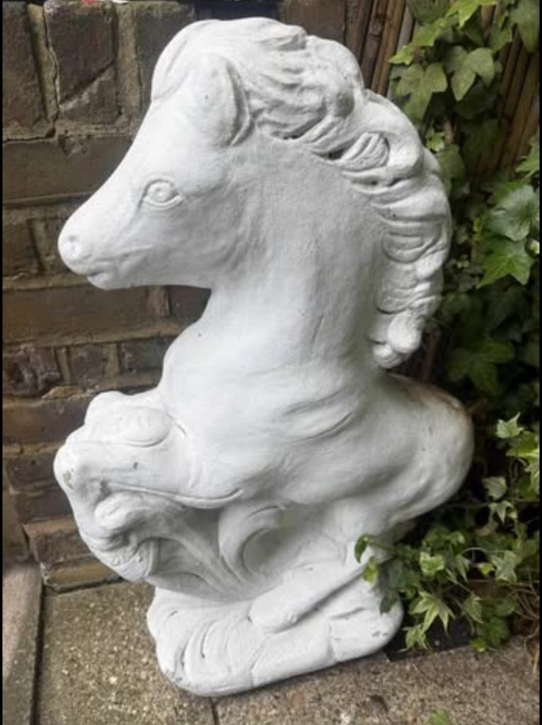 white statue of a horse 🐎 