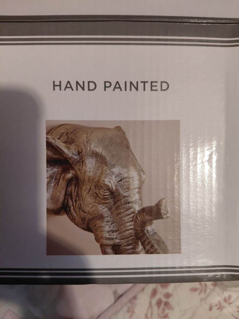 Dunelm Rhino and elephant head wall art