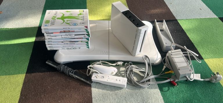 Nintendo Wii Fit Plus Bundle with Console and Games