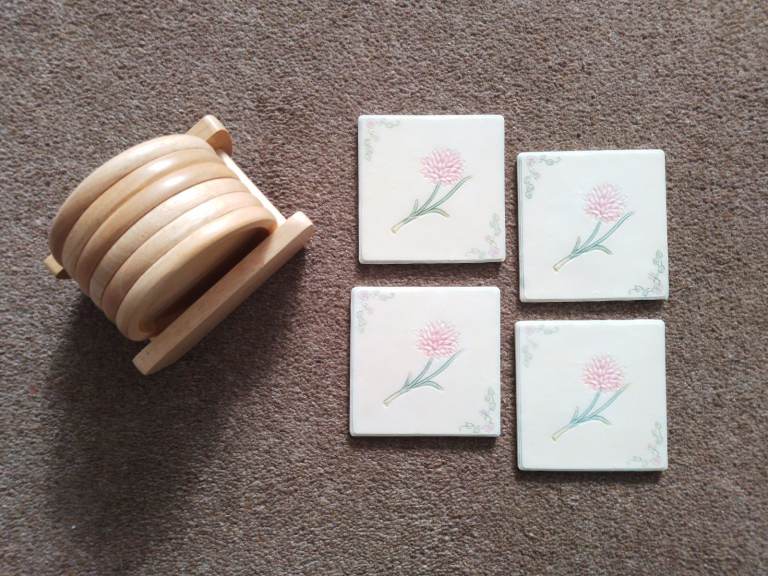 COASTERS - 2 sets, unused. 1st set - polished pine (6), second - decorated, matt finish ceramic. 