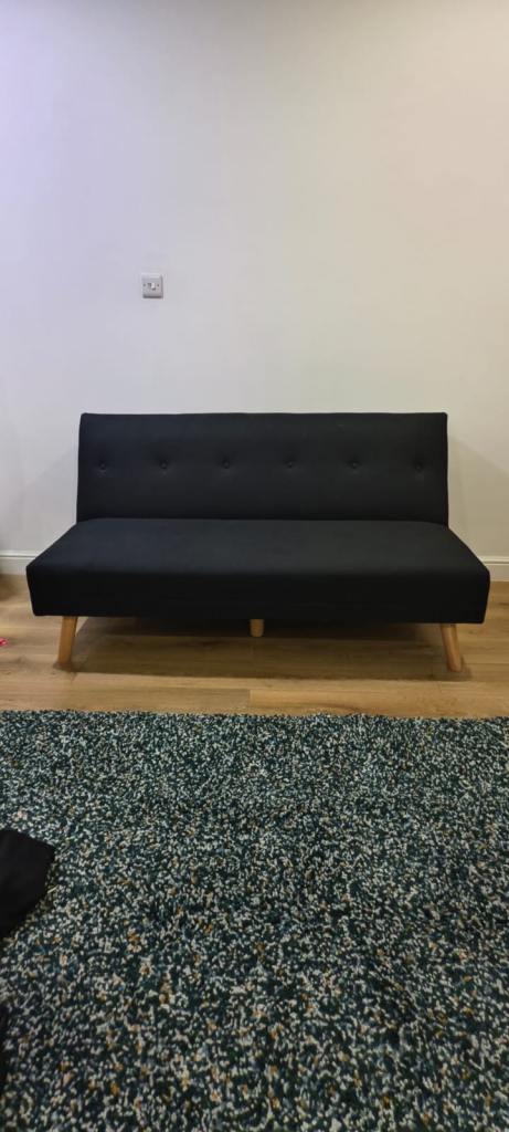 Black Fabric Sofa Bed with Wooden Legs – Good Condition