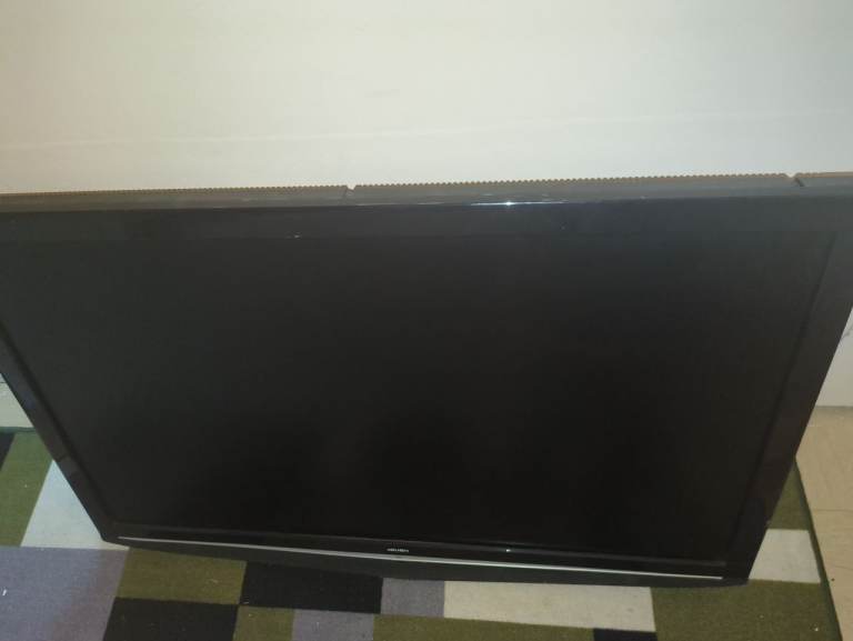 Bush TV with stand and remote 